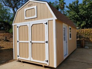 Tan 10x20 ft lofted barn shed with white trim