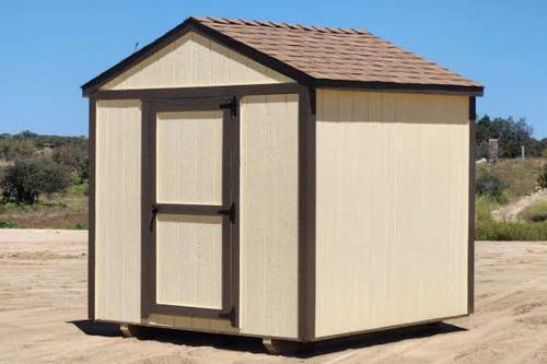 An 8 by 8 foot basic cream shed with brown trim