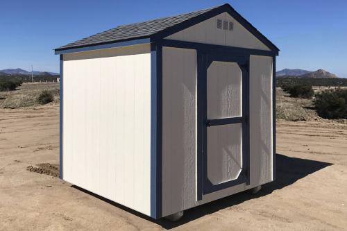 White 8x8 ft basic shed with dark blue trim